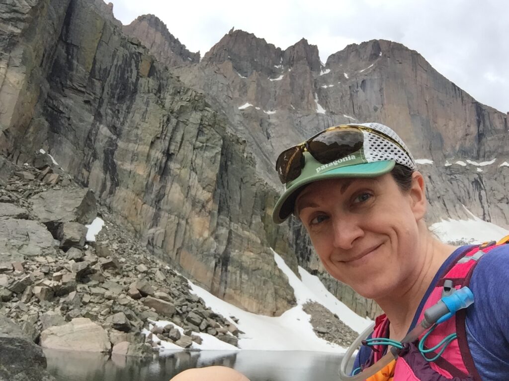 Jenn Fields with Longs Peak in background